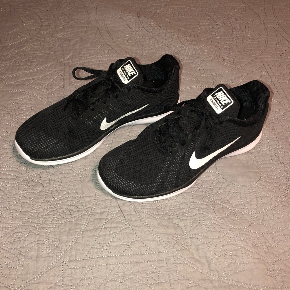 Black and white Nike training shoes
